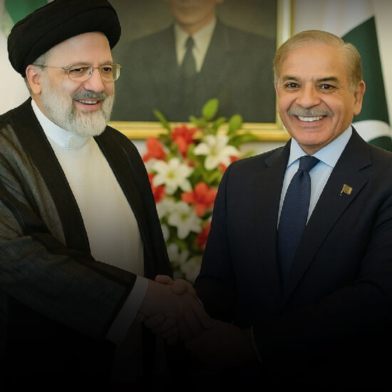 Pakistan and Iran leaders shaking hands at a signing ceremony